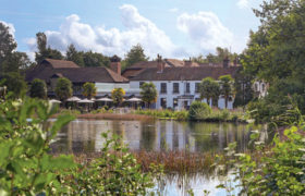 View of hotel from across the Pond - Frensham Pond Country House Hotel & Spa, Farnham, Surrey
