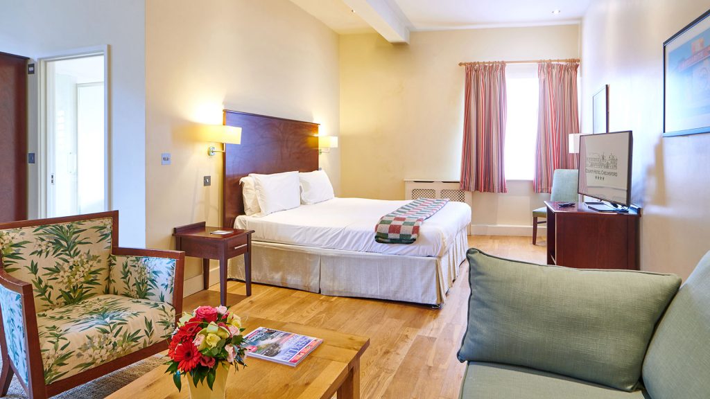 Junior Suite bedroom and living space - County Hotel, Chelmsford