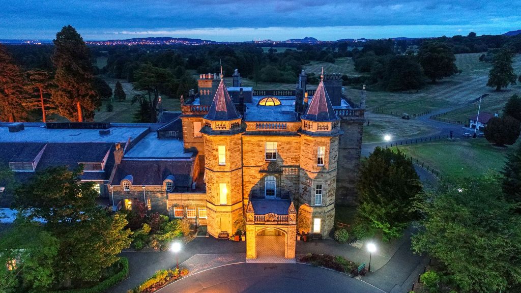 The front entrance to the hotel at twilight - Dalmahoy Hotel & Country Club, Edinburgh
