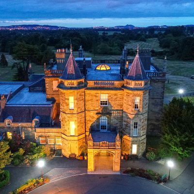 The front entrance to the hotel at twilight - Dalmahoy Hotel & Country Club, Edinburgh