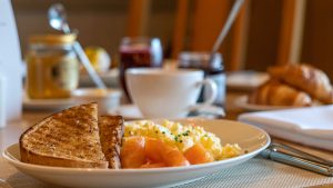 Scrambled eggs and smoked salmon on toast for breakfast in Restaurant 178 - Fairlawns Hotel & Spa, Walsall