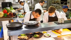 Chefs preparing gourmet food for Cotto Restaurant - Gonville Hotel, Cambridge