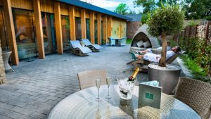 Champagne on ice in the outdoor relaxation area - Hatherley Manor Hotel & Spa, Cotswolds