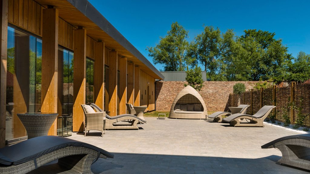 Outdoor courtyard relaxation area - Hatherley Manor Hotel & Spa, Cotswolds