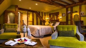 Chilled Champagne and a fruit plate in the Swallows superior room - Hatherley Manor Hotel & Spa, Cotswolds