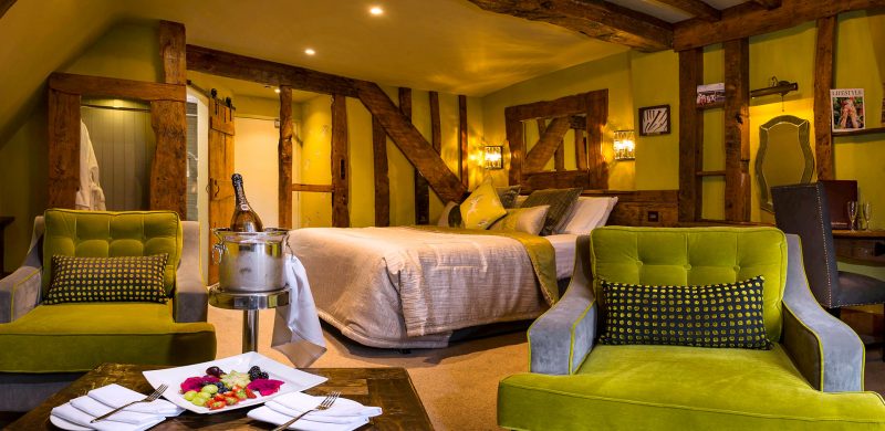 Chilled Champagne and a fruit plate in the Swallows superior room - Hatherley Manor Hotel & Spa, Cotswolds