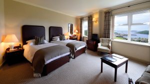 Twin bedroom with views over the Loch - Inver Lodge Hotel, Loch Inver