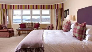Double bed with a view of the Loch - Inver Lodge Hotel, Loch Inver
