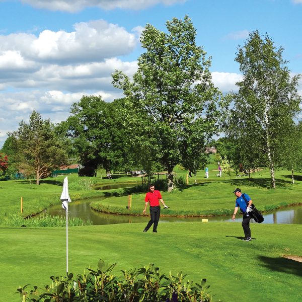 Golfers enjoy the 9 hole golf course - Nailcote Hall Hotel, Warwickshire