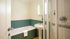 The bathroom in a Classic Plus room - Park Farm Hotel, Norwich