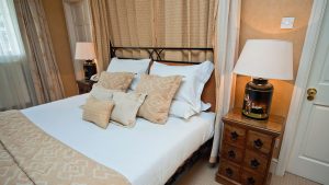 Four poster bed in an Executive Room - Rowton Hall Hotel & Spa, Chester