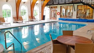 Indoor pool with loungers - Rowton Hall Hotel & Spa, Chester