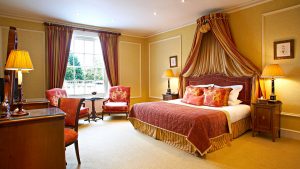 Junior Suite with plush bed and sitting area - Rowton Hall Hotel & Spa, Chester