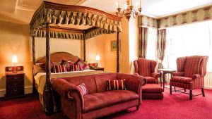 Four poster bed in a Feature room - Weetwood Hall Hotel, Leeds