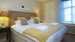 Bedroom in the Florence Suite - Dartington Hall Hotel, South Devon