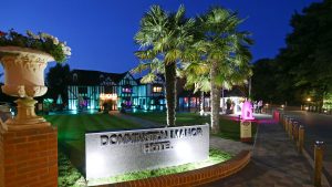 Funky night time lighting and palm trees - Donnington Manor Hotel, Sevenoaks