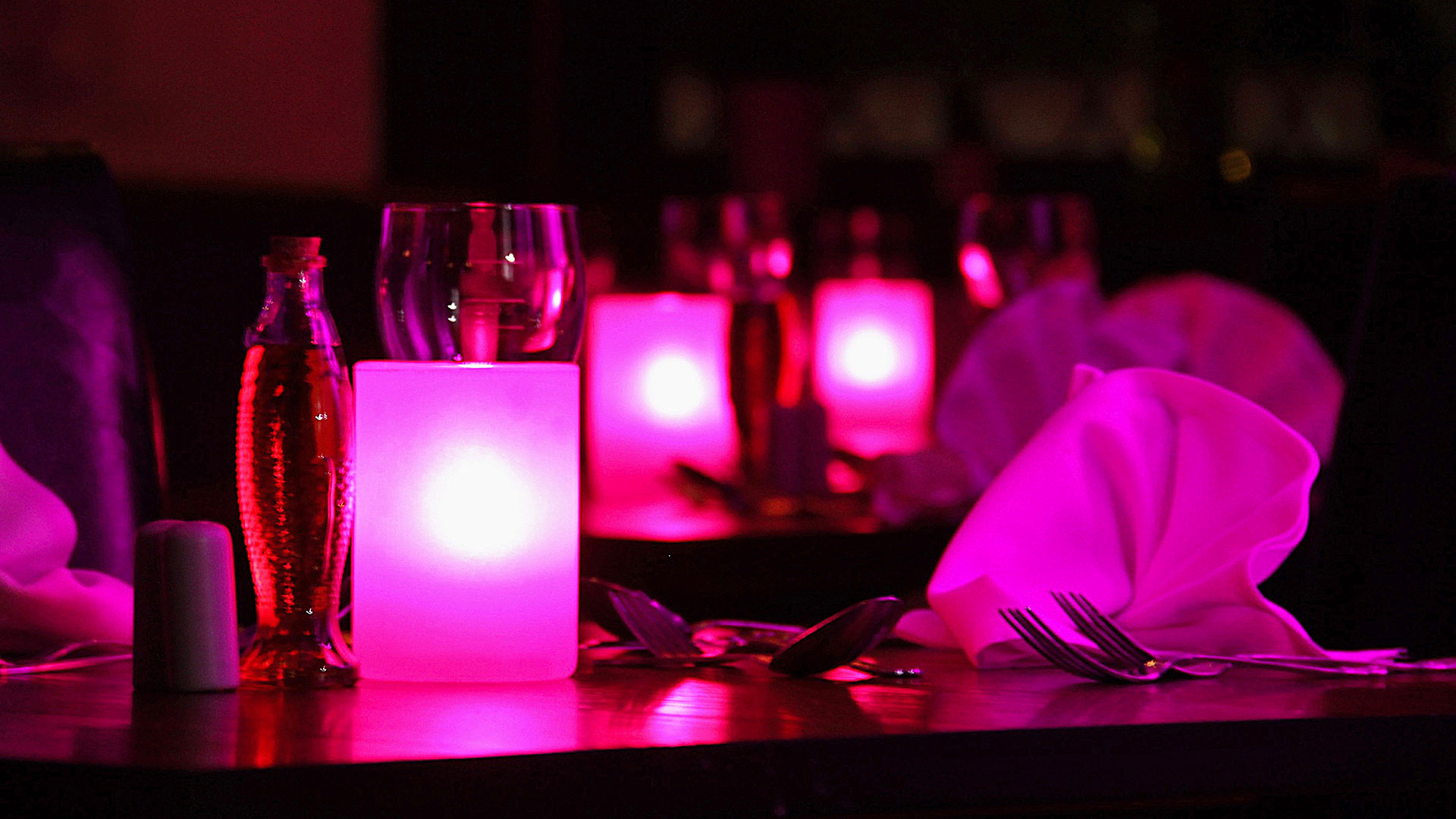 Table set for dinner in the Osteria Chartwell Restaurant - Donnington Manor Hotel, Sevenoaks
