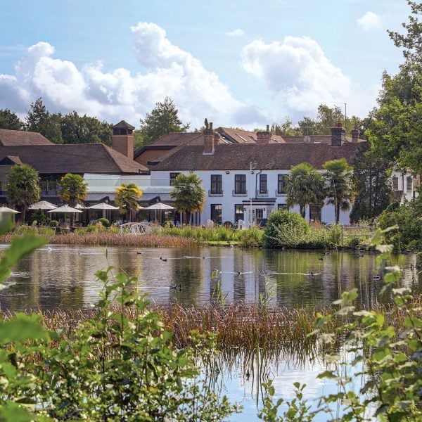 View of the hotel from across the pond - Frensham Pond Country House Hotel & Spa, Farnham