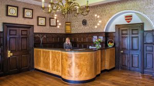 Wood panelled reception - Waterton Park Hotel, Wakefield