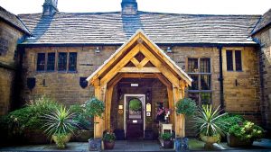 Traditional wooden porch over the entrance - Whitley Hall Hotel, Sheffield