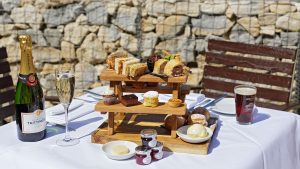 Gentlemans afternoon tea with a bottle of champagne and a craft beer, dining al fresco - Donnington Valley Hotel, Golf & Spa, Newbury