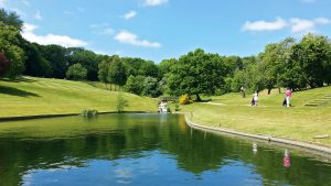 Golfers strolling past the lake on their way to play 18 holes - Donnington Valley Hotel, Golf & Spa, Newbury