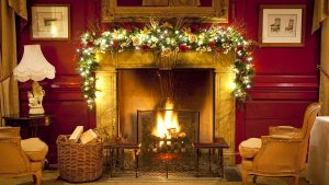 A roaring fire with cosy seating - perfect for Christmas - Hintlesham Hall Hotel, Ipswich