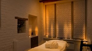 A candlelit treatment room in the spa - Hintlesham Hall Hotel, Ipswich