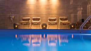 Loungers beside the indoor swimming pool - Ilsington Country House Hotel & Spa, Dartmoor