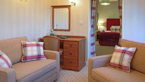Comfortable seating in the separate lounge of a Suite - Ilsington Country House Hotel & Spa, Dartmoor