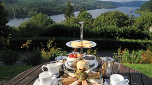 Traditional afternoon tea in the garden overlooking the lake- Lake Vyrnwy Hotel & Spa, Snowdonia
