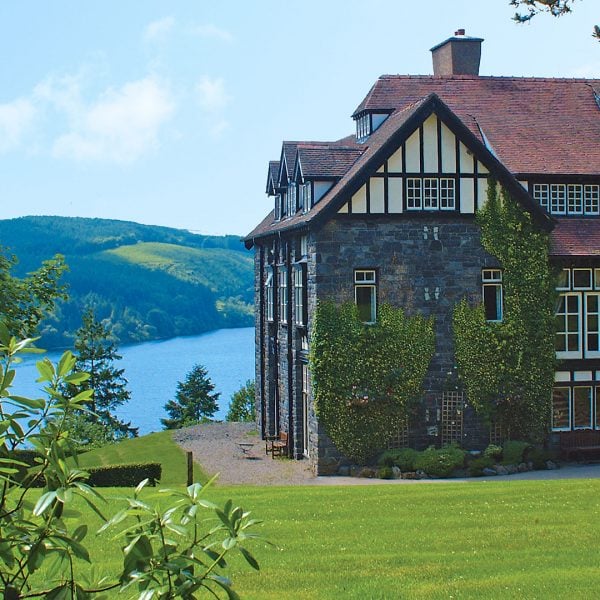 The hotel perched on the edge of the lake - Lake Vyrnwy Hotel & Spa, Snowdonia