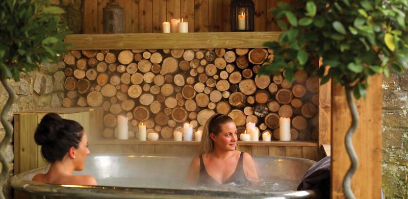 Two ladies enjoying the Garage Spa hot tub - The Morritt Hotel & Garage Spa, Co. Durham
