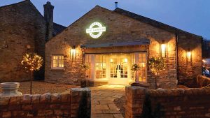 The Garage Spa exterior lit up at night - The Morritt Hotel & Garage Spa, Co. Durham