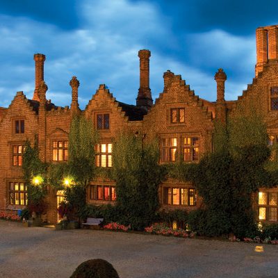 Ivy clad walls of the hotel at dusk - Seckford Hall Hotel, Sudbury