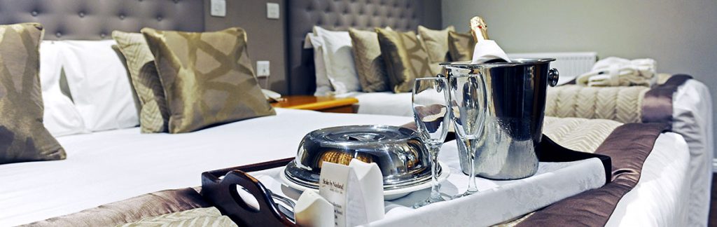 Champagne being served on a Luxury Hotel Room - Classic British Hotels