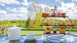 Afternoon Tea on the patio, overlooking the lawns - Stoke by Nayland Hotel, Golf & Spa