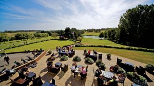 Dining on the patio in the sunshine overlooking the golf course - Stoke by Nayland Hotel, Golf & Spa