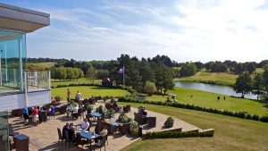 Enjoying drinks on the Terrace Bar in the sunshine overlooking the golf course - Stoke by Nayland Hotel, Golf & Spa