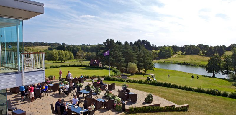 Enjoying drinks on the Terrace Bar in the sunshine overlooking the golf course - Stoke by Nayland Hotel, Golf & Spa