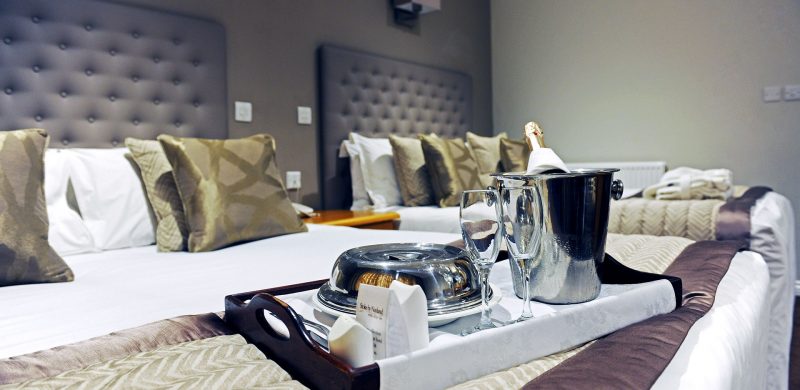 Bottle of Champagne and room service in a Deluxe twin room - Stoke by Nayland Hotel, Golf & Spa