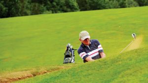 Golfer playing on the golf course - Stoke by Nayland Hotel, Golf & Spa