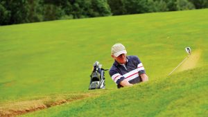 Golfer playing on the golf course - Stoke by Nayland Hotel, Golf & Spa