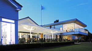 Outside dining and the terrace bar in twilight - Stoke by Nayland Hotel, Golf & Spa