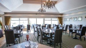 The Lakes Restaurant set for dinner - Stoke by Nayland Hotel, Golf & Spa