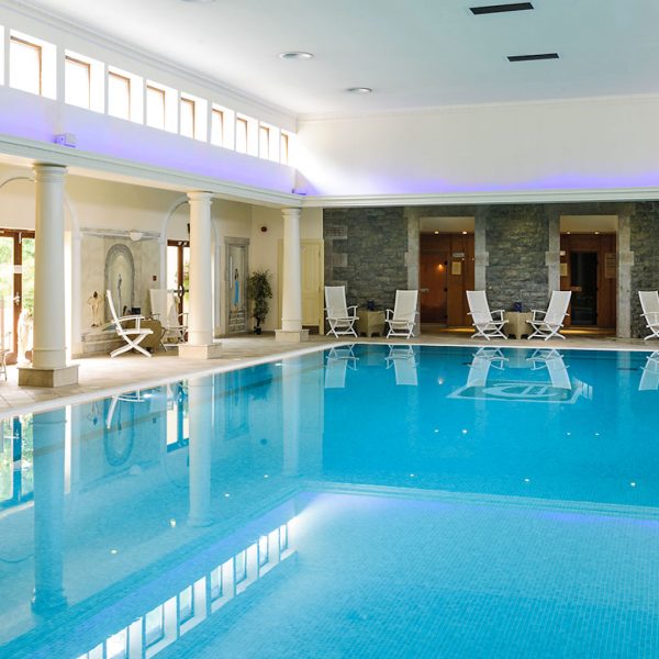Indoor pool with seating - Tre-Ysgawen Hall Hotel & Spa, Isle of Anglesey