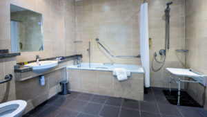 The bathroom of an accessible twin Room - Gonville Hotel, Cambridge