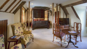 Four poster bed in a Superior Room - Hintlesham Hall Hotel, Suffolk