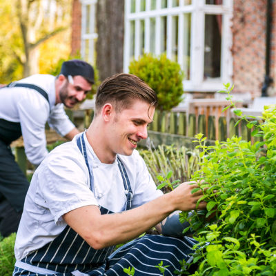 The chefs picking fresh herbs from the garden - Deans Place Hotel, Alfriston