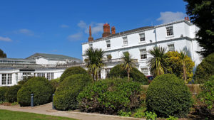 Hotel exterior overlooking the lawn - Rowton Hall Hotel, Chester